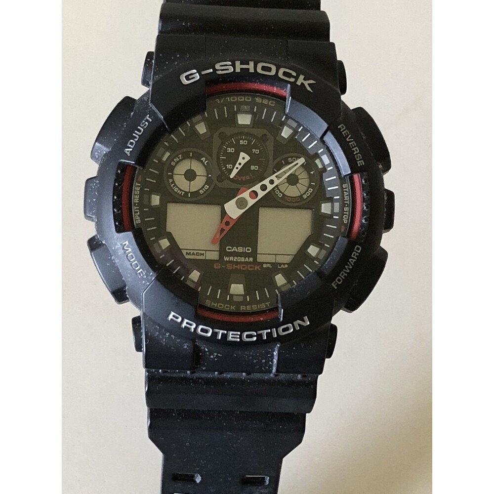 New Without Tags Casio G-Shock GA100-1A2DR Men’s Red And Black Wrist Watch